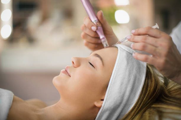A woman getting her hair cut at the salon